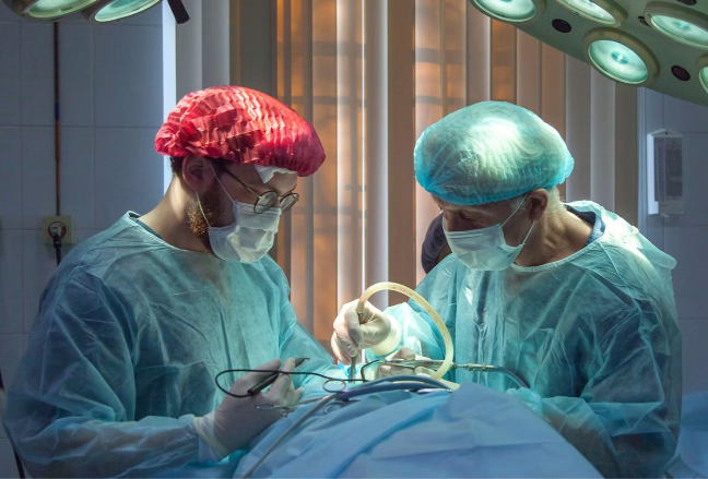 Surgeon performing orthopedic procedure