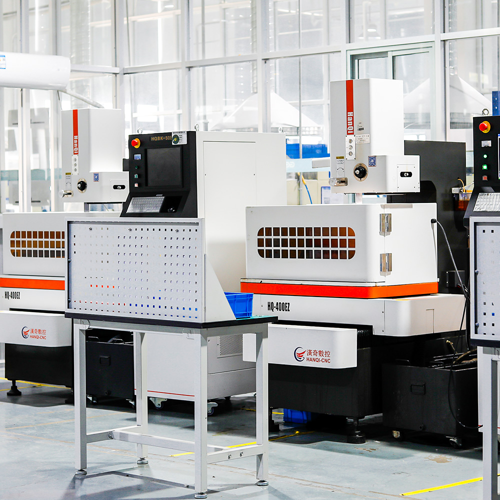 Illustrative precision manufacturing environment with a five-axis CNC machining center